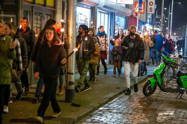 February 5, 2021, Tilburg, North Brabant, Netherlands: Protesters marching with torches during the demonstration..A torch-lit protest was held against the new measures that the government imposed in January to fight the spread of the Coronavirus Covid-19 pandemic. The Anti-Curfew and Anti-lockdown demonstration were peaceful. A strict curfew is applied in the Netherlands between 21:00-04:30. Violent protests against the Covid 19 measures took place in January. Tilburg Netherlands - ZUMAs197 20210205_zaa_s197_267 Copyright: xNikxOikox