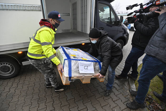 The first delivery of the vaccine against coronavirus from the AstraZeneca firm arrived in the dispatching centre of the Avenier company in Ricany near Prague, Czech Republic, on Saturday morning, February 6, 2021. (CTKxPhoto MichalxKamaryt) CTKPhotoP202102060166201  kmt 1