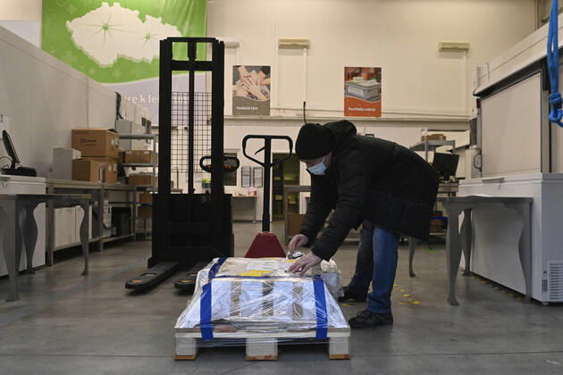 The first delivery of the vaccine against coronavirus from the AstraZeneca firm arrived in the dispatching centre of the Avenier company in Ricany near Prague, Czech Republic, on Saturday morning, February 6, 2021. (CTKxPhoto MichalxKamaryt) CTKPhotoP202102060168501  kmt 3