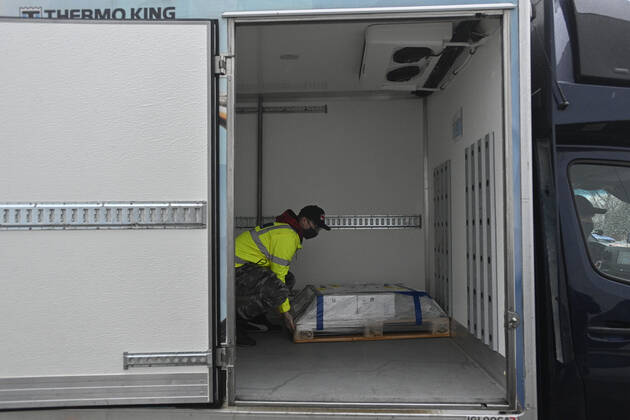 The first delivery of the vaccine against coronavirus from the AstraZeneca firm arrived in the dispatching centre of the Avenier company in Ricany near Prague, Czech Republic, on Saturday morning, February 6, 2021. (CTKxPhoto MichalxKamaryt) CTKPhotoP202102060170901  kmt 5