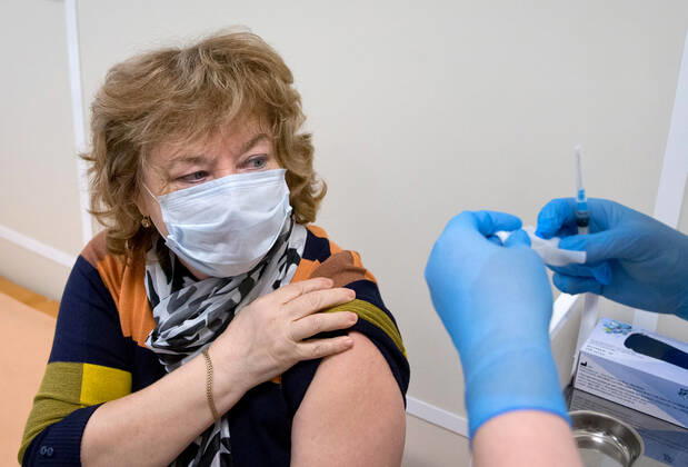SEVASTOPOL, RUSSIA - FEBRUARY 8, 2021: A patient during vaccination with the Gam-COVID-Vak (Sputnik V) vaccine against COVID-19 at Dasha Sevastopolskaya Hospital No 5. Sergei Malgavko TASS  TS0F6429
