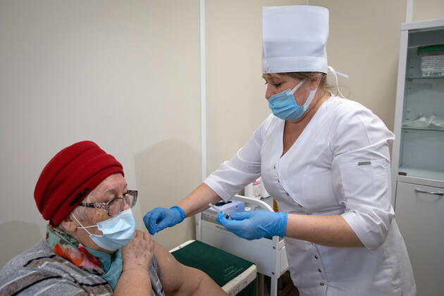 SEVASTOPOL, RUSSIA - FEBRUARY 8, 2021: A patient and a medical worker during vaccination with the Gam-COVID-Vak (Sputnik V) vaccine against COVID-19 at Dasha Sevastopolskaya Hospital No 5. Sergei Malgavko TASS  TS0F642D