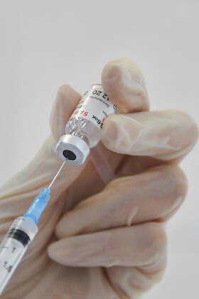 VLADIVOSTOK, RUSSIA - FEBRUARY 9, 2021: Filling a syringe with component 2 of the Gam-COVID-Vac (Sputnik V) vaccine against COVID-19 in one of the city s outpatient clinics. Yuri Smityuk TASS  TS0F64A0