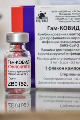 VLADIVOSTOK, RUSSIA - FEBRUARY 9, 2021: An ampoule containing component 2 of the Gam-COVID-Vac (Sputnik V) vaccine against COVID-19 kept in one of the city s outpatient clinics. Yuri Smityuk TASS  TS0F64A9