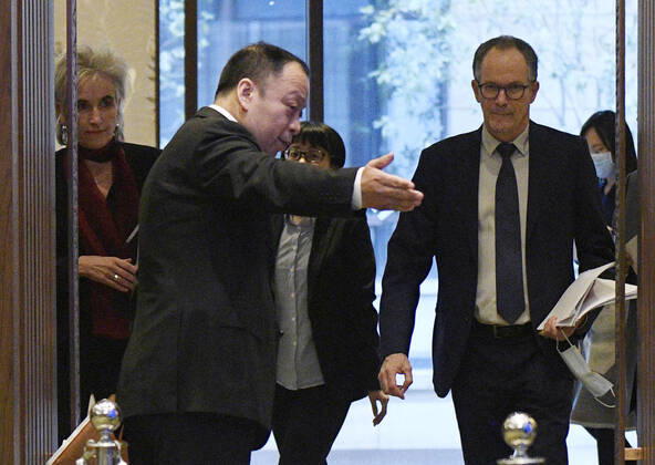 WHO investigation into coronavirus origins in Wuhan Members of the World Health Organization s team investigating the origins of the coronavirus pandemic prepare to attend a press conference in Wuhan, China, on Feb. 9, 2021, a day ahead of their departure. 