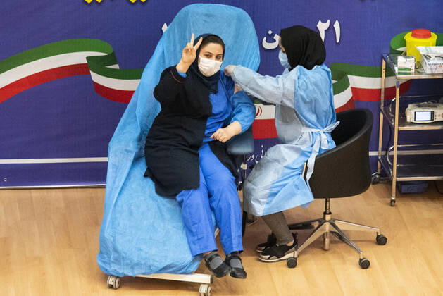 Iran: First vaccinations for Medical Staff An Iranian medical Staff gets the Sputnik V Covid-19 vaccine. First COVID-19 vaccinations for Iranian medical Staff were injected with Russian s Sputnik V vaccine at the Imam Khomeini Hospital Complex in Tehran, Iran on 9 Feb 2021. Tehran Tehran Iran Copyright: SobhanxFarajvan
