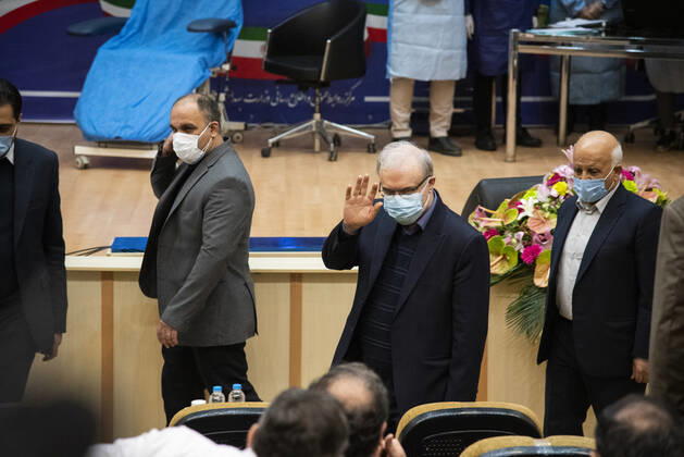 Iran: First vaccinations for Medical Staff Saeed Namaki , Iran s Minister of Health shakes hands with the media. First COVID-19 vaccinations for Iranian medical Staff were injected with Russian s Sputnik V vaccine at the Imam Khomeini Hospital Complex in Tehran, Iran on 9 Feb 2021. Tehran Tehran Iran Copyright: SobhanxFarajvan
