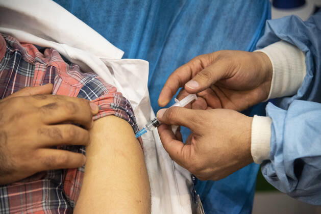 Iran: First vaccinations for Medical Staff An Iranian medical Staff gets the Sputnik V Covid-19 vaccine. First COVID-19 vaccinations for Iranian medical Staff were injected with Russian s Sputnik V vaccine at the Imam Khomeini Hospital Complex in Tehran, Iran on 9 Feb 2021. Tehran Tehran Iran Copyright: SobhanxFarajvan
