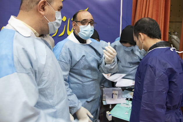 Iran: First vaccinations for Medical Staff First COVID-19 vaccinations for Iranian medical Staff were injected with Russian s Sputnik V vaccine at the Imam Khomeini Hospital Complex in Tehran, Iran on 9 Feb 2021. Tehran Tehran Iran Copyright: SobhanxFarajvan