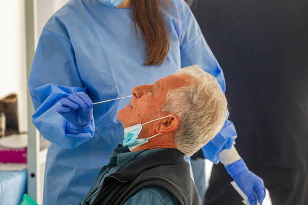 February 9, 2021, Nicosia, Cyprus: A medical worker wearing a personal protective equipment suit ( PPE) takes a swab sample at a Covid-19 testing center..The government of Cyprus is now providing free Covid-19 testing for all of it s residence. Nicosia Cyprus - ZUMAs197 20210209_zaa_s197_055 Copyright: xGeorgexChristophoroux