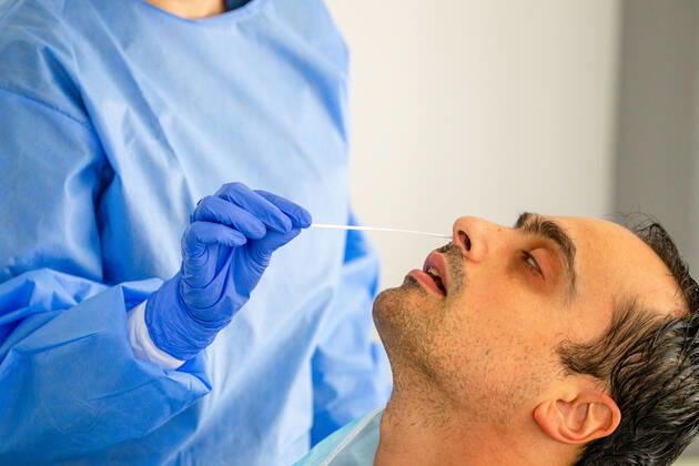 February 9, 2021, Nicosia, Cyprus: A medical worker wearing a personal protective equipment suit ( PPE) takes a swab sample at a Covid-19 testing center..The government of Cyprus is now providing free Covid-19 testing for all of it s residence. Nicosia Cyprus - ZUMAs197 20210209_zaa_s197_059 Copyright: xGeorgexChristophoroux
