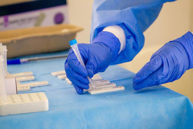 February 9, 2021, Nicosia, Cyprus: A medical worker checks a swab sample at a Covid-19 testing center..The government of Cyprus is now providing free Covid-19 testing for all of it s residence. Nicosia Cyprus - ZUMAs197 20210209_zaa_s197_060 Copyright: xGeorgexChristophoroux