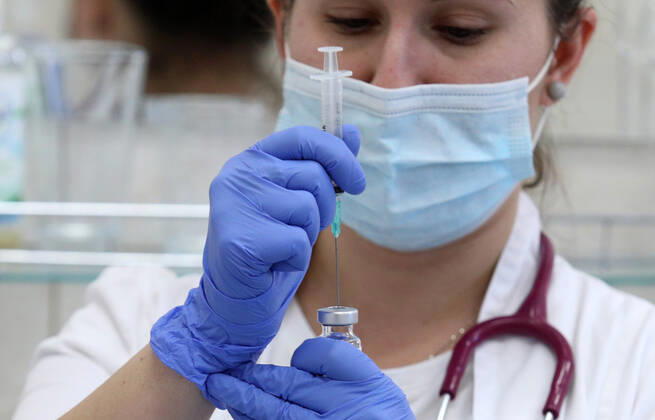 CROATIA COVID-19 VACCINE A medical personel fills a syringe with the COVID-19 AstraZeneca vaccine at the Retirement home in Sibenik, Croatia on February 09, 2021. DuskoxJaramaz PIXSELL