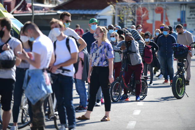 (210209) -- TEL AVIV, Feb. 9, 2021 -- People wait to receive the COVID-19 vaccine at a medical center in Tel Aviv, Israel, Feb. 9, 2021. Israel s Ministry of Health reported 6,574 new COVID-19 cases on Tuesday, raising the tally of confirmed cases in the country to 703,102. ( JINI via Xinhua) ISRAEL-TEL AVIV-COVID-19-CASES-SEVEN MILLION GideonxMarkowicz 