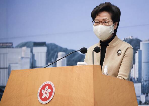 (210210) -- HONG KONG, Feb. 10, 2021 -- Carrie Lam, chief executive of the Hong Kong Special Administrative Region (HKSAR), speaks at a press conference in south China s Hong Kong, Feb. 9, 2021. Carrie Lam said on Tuesday that the fourth wave of COVID-19 in Hong Kong has obviously eased. Compared with the peak when more than 600 confirmed cases were reported each week in the past two months, the number of newly confirmed cases in the last seven days has dropped nearly 70 percent. She said if the epidemic situation does not worsen, there will be conditions to gradually resume normal life after the Chinese New Year, including the resumption of face-to-face classes in schools and the reopening of some of the business premises that have been