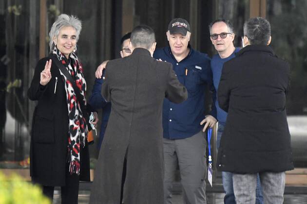 WHO team s departure after Wuhan mission Members of a World Health Organization team pose for a photo before leaving their hotel for the airport at the end of their mission to investigate the origins of the coronavirus pandemic in Wuhan, China, on Feb. 10, 2021. 