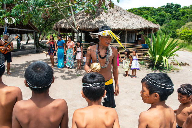 COVID-19 vaccination indigenous, Rio de Janeiro, Brazil - 10 Feb 2021 Guarani Mbya, indigenous people who live in the village of Mata Verde Bonita, in the city of Marica, metropolitan region of Rio de Janeiro, celebrating Covid vaccination in ritual dance of thanks to NHANDERU , the GuaraniÂ s supreme God on February 10, 2021. Rio de Janeiro Brazil 6058_230226 Copyright: xChicoxFerreira PentaxPressx