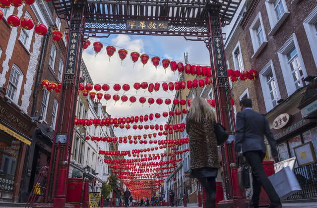 February 10, 2021, London, United Kingdom: People walking along the Street of China Town in London..Chinese New Year is the biggest festival in Asia. Every year, hundreds of thousands of people usually descend on the West End in London to enjoy a colorful parade, free stage performances and traditional Chinese food, and to wish each other Xin Nian Kuai Le (Happy New Year in Mandarin) or San Nin Faai Lok (in Cantonese). Due to national lockdown restrictions, people can enjoy London s Chinese New Year entertainment from home with an online celebration of past Chinese New Year festivities, alongside performances from emerging Chinese artists. London United Kingdom - ZUMAs197 20210210_zaa_s197_375 Copyright: xMayxJamesx