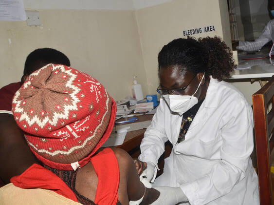 (210211) -- WAKISO, Feb. 11, 2021 -- A female medical worker works at a health centre, Wakiso District in Central Uganda, Feb. 10, 2021. As the world commemorates International Day of Women and Girls in Science on Thursday, female scientists in Uganda are championing the fight against the COVID-19 pandemic. TO GO WITH Feature: Ugandan female scientists champion fight against COVID-19 (Photo by Xinhua) UGANDA-WAKISO-INTERNATIONAL DAY OF WOMEN AND GIRLS IN SCIENCE NicholasxKajoba 