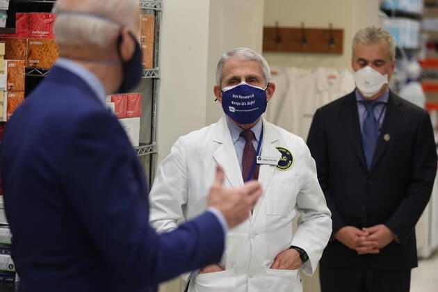 President Joe Biden and Dr. Anthony Fauci speak at the National Institutes of Health on Thursday, February 11, 2021 in Bethesda, Maryland.  WAX20210211930 OliverxContreras