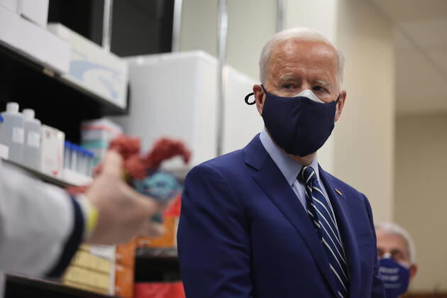President Joe Biden and Dr. Anthony Fauci speak at the National Institutes of Health on Thursday, February 11, 2021 in Bethesda, Maryland.  WAX20210211931 OliverxContreras