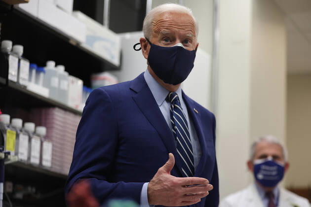 President Joe Biden and Dr. Anthony Fauci speak at the National Institutes of Health on Thursday, February 11, 2021 in Bethesda, Maryland.  WAX20210211932 OliverxContreras