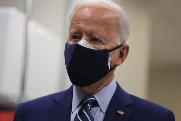 President Joe Biden and Dr. Anthony Fauci speak at the National Institutes of Health on Thursday, February 11, 2021 in Bethesda, Maryland.  WAX20210211937 OliverxContreras