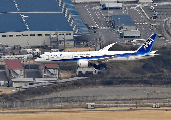 1st batch of Pfizer COVID-19 vaccine arrives in Japan Photo taken from a Kyodo News helicopter on Feb. 12, 2021, shows an airplane carrying the first batch of the coronavirus vaccine developed by U.S. pharmaceutical giant Pfizer Inc. arriving at Japan s Narita airport near Tokyo from Brussels. 