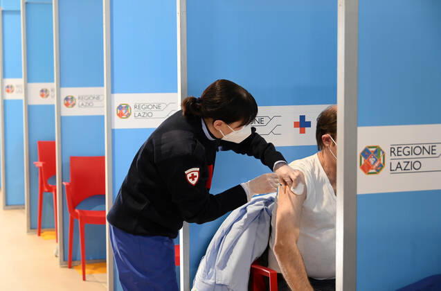 (210211) -- ROME, Feb. 11, 2021 -- A medical worker receives the COVID-19 vaccine at a vaccination center at Rome s Fiumicino Airport, Italy, on Feb. 11, 2021. About one month after easing most restrictions on people s movements, Italy maintained a downward trend in active coronavirus infections, the latest official data showed. The three coronavirus vaccines authorized in Italy -- Pfizer BioNTech, Moderna and AstraZeneca -- have been administered to almost 2.8 million people, according to the data by Coronavirus Emergency Commissioner Domenico Arcuri s office. (Photo by Xinhua) ITALY-ROME-AIRPORT-VACCINATION AlbertoxLingria 