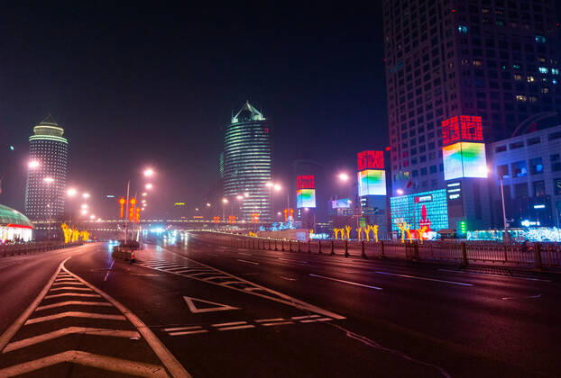 BEIJING, CHINA - FEBRUARY 11, 2021: A street in Guomao Business District decorated for celebrations of Chinese New Year 4719, the Year of the Ox. Artyom Ivanov TASS  TS0F6914