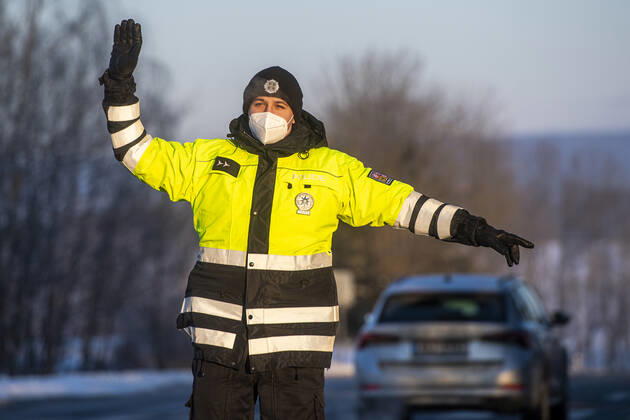 As of midnight, the Czech government restricted movement from Trutnov, Cheb and Sokolov districts and to them because of the fast spread of the COVID-19 infection. Pictured police control on the I 37 road near Kuks, Czech Republic, February 12, 2021. (CTKxPhoto DavidxTanecek) CTKPhotoP202102120273901  TAD 005