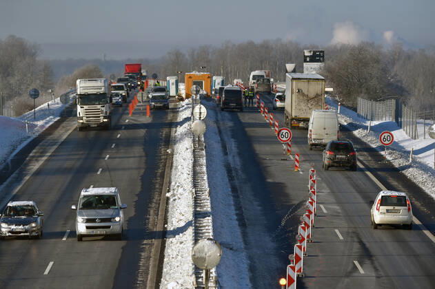 As of midnight, the Czech government restricted movement from Trutnov, Cheb and Sokolov districts and to them because of the fast spread of the COVID-19 infection. Pictured police control on the D6 highway near Hory (Sokolov district), Czech Republic, February 12, 2021. (CTKxPhoto SlavomirxKubes) CTKPhotoP202102120325201  KBS_0013