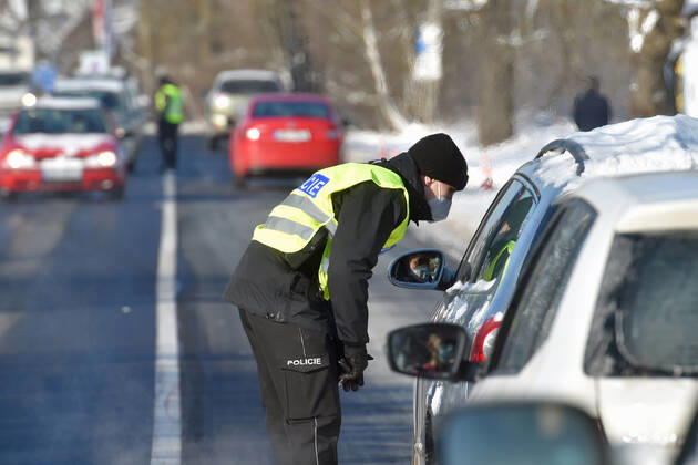 As of midnight, the Czech government restricted movement from Trutnov, Cheb and Sokolov districts and to them because of the fast spread of the COVID-19 infection. Pictured police control on the road in Chodov (Sokolov district), Czech Republic, February 12, 2021. (CTKxPhoto SlavomirxKubes) CTKPhotoP202102120370201  KBS_0050
