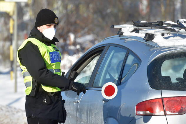 As of midnight, the Czech government restricted movement from Trutnov, Cheb and Sokolov districts and to them because of the fast spread of the COVID-19 infection. Pictured police control on the road in Chodov (Sokolov district), Czech Republic, February 12, 2021. (CTKxPhoto SlavomirxKubes) CTKPhotoP202102120370401  KBS_0051