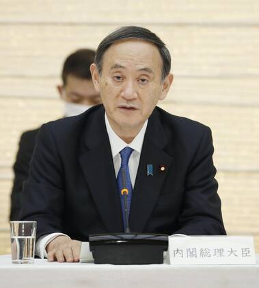 Japan PM Suga at coronavirus meeting Japanese Prime Minister Yoshihide Suga speaks during a meeting of the government s anti-coronavirus task force at his office in Tokyo on Feb. 12, 2021. 