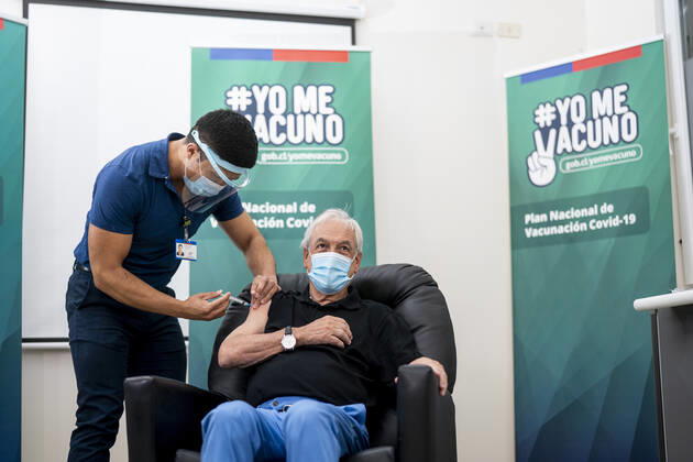 (210212) -- FUTRONO, Feb. 12, 2021 -- Chilean President Sebastian Pinera receives the COVID-19 vaccine developed by Chinese firm Sinovac at a health center in Futrono, a city in the southern region of Los Rios, Chile, Feb. 12, 2021. ( Handout via Xinhua) CHILE-FUTRONO-PRESIDENT-VACCINE-COVID-19 ChileanxPresidentialxPalace 