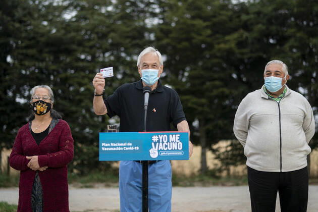 (210212) -- FUTRONO, Feb. 12, 2021 -- Chilean President Sebastian Pinera speaks after receiving the COVID-19 vaccine developed by Chinese firm Sinovac at a health center in Futrono, a city in the southern region of Los Rios, Chile, Feb. 12, 2021. ( Handout via Xinhua) CHILE-FUTRONO-PRESIDENT-VACCINE-COVID-19 ChileanxPresidentialxPalace 