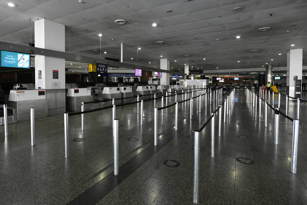 VICTORIA CORONAVIRUS COVID19, Empty international check-in terminals are seen at Melbourne Airport in Melbourne, Saturday, February 13, 2021. Victoria has entered a short, sharp circuit-breaker lockdown for five days amid fears the highly infectious UK strain of coronavirus has spread in the community. ( NO ARCHIVING, EDITORIAL USE ONLY, NO USE IN BOOKS WITHOUT CONSENT MELBOURNE VIC AUSTRALIA  Copyright: xERIKxANDERSONx 20210213001520257365