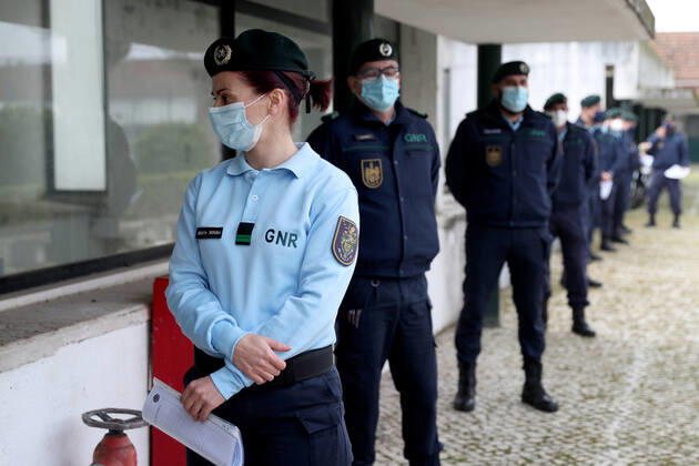 February 13, 2021, Lisbon, Portugal: National Republican Guard officers wait in line to receive a first dose of the AstraZeneca Covid-19 vaccine on the first day of the security forces inoculation at the Conde de Lippe military barracks in Lisbon, Portugal, on February 13, 2021. Lisbon Portugal - ZUMAf123 20210213_zap_f123_005 Copyright: xPedroxFiuzax