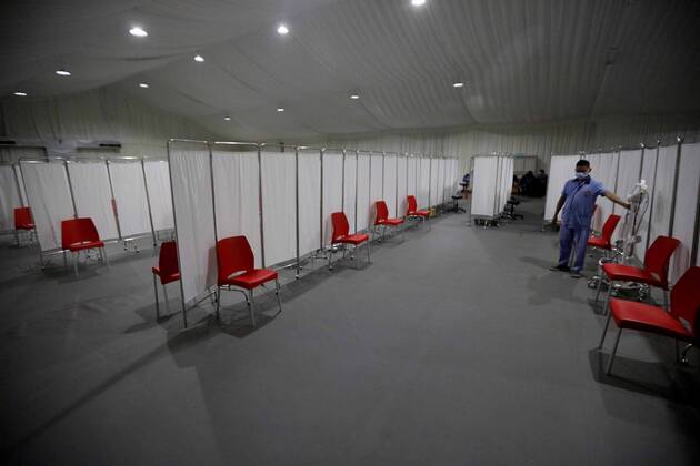 (210213) -- BEIRUT, Feb. 13, 2021 -- A worker is seen in a COVID-19 vaccination center at a hospital in Beirut, Lebanon, on Feb. 13, 2021. Lebanon received on Saturday the first batch of Pfizer-BioNTech vaccines with the vaccination campaign set to begin on Sunday. ) LEBANON-BEIRUT-COVID-19 VACCINES-PREPARATIONS BilalxJawich 