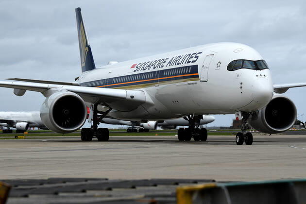 AUSTRALIA PFIZER VACCINE ARRIVAL, Singapore Airlines flight SQ231, carrying the first shipment of the Pfizer vaccine, touches down at Sydney International Airport on Monday, February 15, 2021. More than 142,000 doses of the Pfizer BioNTech COZVID-19 vaccine have arrived at Sydney airport in Australia?s response to the pandemic. This is the first shipment of 20 million doses of the Pfizer vaccine the Government has secured as part of Australia?s COVID-19 Vaccine and Treatment Strategy.( NO ARCHIVING, EDITORIAL USE ONLY, NO USE IN BOOKS WITHOUT CONSENT  Copyright: xBIANCAxDExMARCHIx 20210215001520717306