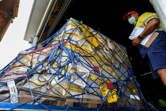 AUSTRALIA PFIZER VACCINE ARRIVAL, The first Australian shipment of Pfizer COVID-19 vaccines is prepared for transport to the storage facility after landing at Sydney International Airport on Monday, February 15, 2021. More than 142,000 doses of the Pfizer BioNTech COVID-19 vaccine have arrived at Sydney airport in Australia?s response to the pandemic. This is the first shipment of 20 million doses of the Pfizer vaccine the Government has secured as part of Australia?s COVID-19 Vaccine and Treatment Strategy. ( NO ARCHIVING, EDITORIAL USE ONLY, NO USE IN BOOKS WITHOUT CONSENT  Copyright: xBIANCAxDExMARCHIx 20210215001520722208