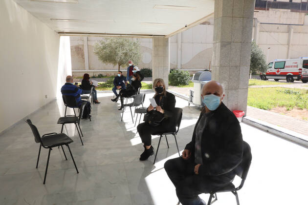February 14, 2021, Beirut, Beirut, Lebanon: People wait to receive the COVID-19 Pfizer BioNTech vaccine at Lebanon s American University Medical Center in the capital Beirut, on February 14, 2021, as the country kickstarts its inoculation campaign. - Lebanon gave its first COVID-19 vaccine dose to a doctor, as it started inoculation it hopes will keep the pandemic in check amid a deepening economic crisis Beirut Lebanon - ZUMAap3_ 20210214_zaf_ap3_227 Copyright: xHaithamxMoussawix