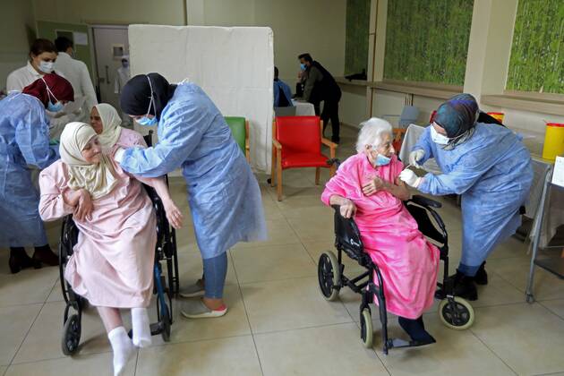 (210215) -- BEIRUT, Feb. 15, 2021 -- Elderly people receive the COVID-19 vaccine at a nursing home in Beirut, Lebanon on Feb. 15, 2021. Lebanon recorded on Monday 1,793 new COVID-19 cases, raising the total number of infections to 340,861, the Health Ministry reported. Lebanon launched on Sunday its vaccination campaign against COVID-19. ) LEBANON-BEIRUT-COVID-19-VACCINATION-ELDERLY PEOPLE BilalxJawich 