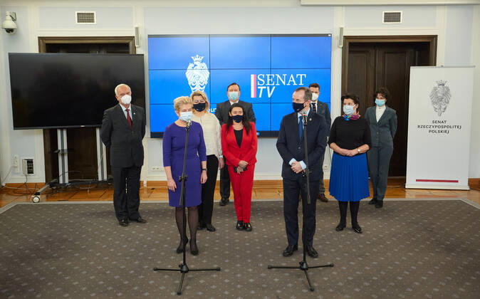 February 16, 2021, Warsaw, Mazovian, Poland: Press Conference With The Participation Of The Marshal Of The Senate, TOMASZ GRODZKI, Senator BEAT MALECKA-LIBERA, Chairman Of The Health Committee, And Members And Experts Of The Committee. The Conference Was Combined With The Presentation Of A Special Film Promoting Vaccination Against COVID-19. .in the picture: BEATA MALECKA-LIBERA, TOMASZ GRODZKI Warsaw Poland - ZUMAm332 20210216_zip_m332_002 Copyright: xHubertxMathisx