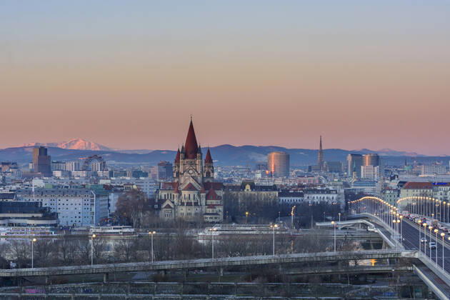 Vienna city center, river Donau (Danube), bridge Reichsbrücke, church Franz von Assisi, cathedral Stephansdom (St. Stephen s Cathedral), Ferris Wheel in Prater, mountain Schneeberg (left) Wien, Vienna Wien Austria 00. overview