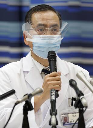 Japan begins COVID-19 vaccine to health workers Kazuhiro Araki, head of the Tokyo Medical Center, meets the press at his hospital in Tokyo s Meguro Ward on Feb. 17, 2021, after he was administered the first COVID-19 vaccine under Japan s program against the novel coronavirus. Japan is starting with an initial group of 40,000 health workers before expanding the rollout to the elderly and people with preexisting conditions. 