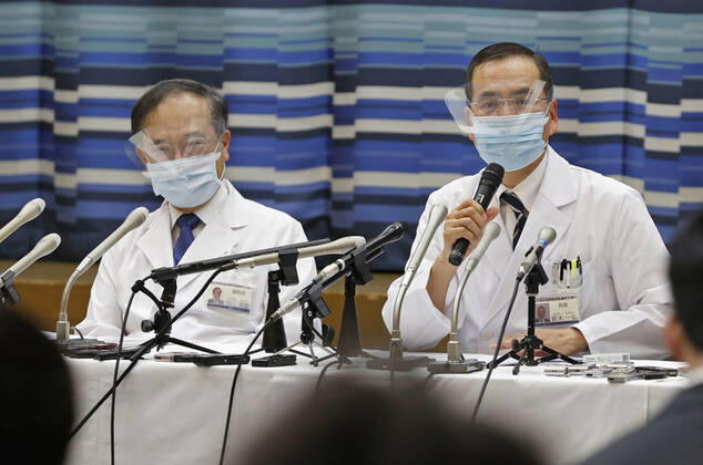 Japan begins COVID-19 vaccine to health workers Kazuhiro Araki (R), head of the Tokyo Medical Center, meets the press at his hospital in Tokyo s Meguro Ward on Feb. 17, 2021, after he was administered the first COVID-19 vaccine under Japan s coronavirus vaccination project. Japan is starting with an initial group of 40,000 health workers before expanding the rollout to the elderly and people with preexisting conditions. 