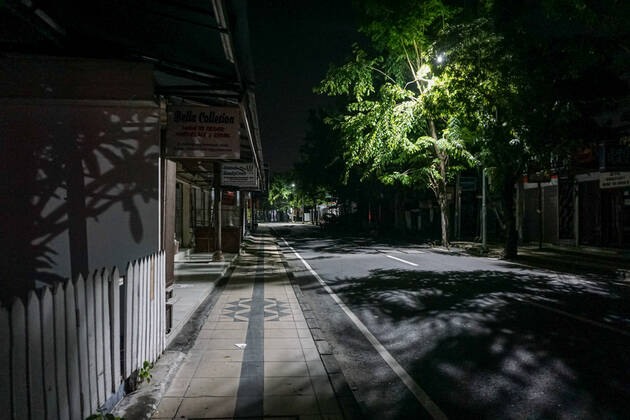 February 16, 2021, Badung, Bali, Indonesia: An empty and deserted street during curfew time..Bali famous tourism-shopping area of Seminyak s condition after 9:00 pm curfew amid covid-19 pandemic. Badung Indonesia - ZUMAs197 20210216_zaa_s197_138 Copyright: xDickyxBisinglasix