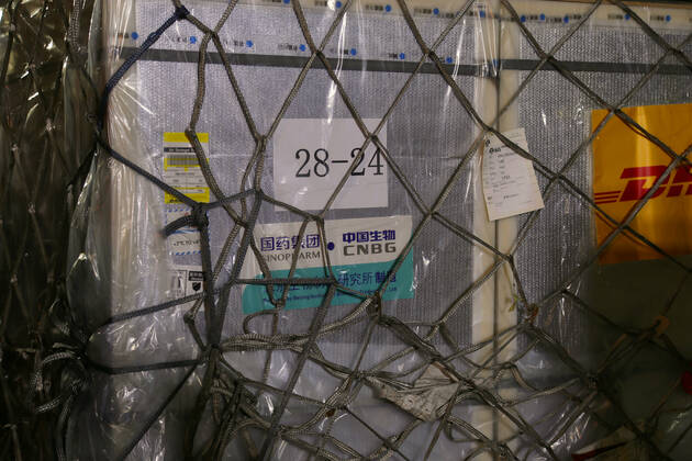 (210218) -- DAKAR, Feb. 18, 2021 -- Photo taken on Feb. 17, 2021 shows the first batch of China s Sinopharm COVID-19 vaccine at Blaise Diagne International Airport in Dakar, Senegal. Senegal on Wednesday night received the first batch of China s Sinopharm COVID-19 vaccine. ) SENEGAL-DAKAR-CHINESE COVID-19 VACCINE-ARRIVAL XingxJianqiao 